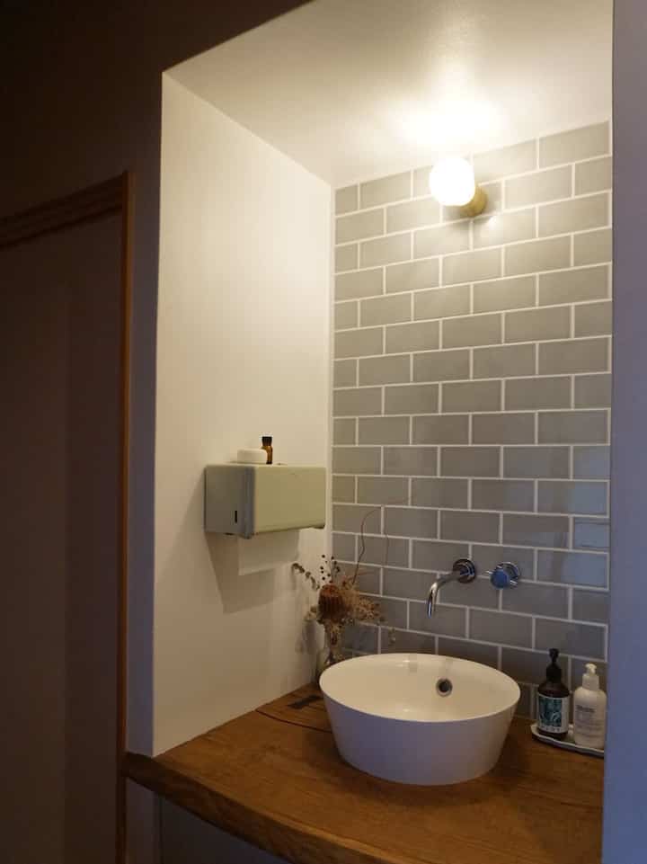 Hand washing corner outside the toilet

This is my favorite space, set up so that customers can wash their hands without going into the bathroom 𓇬

#Hand washing area
#Faucet
#Tile wall