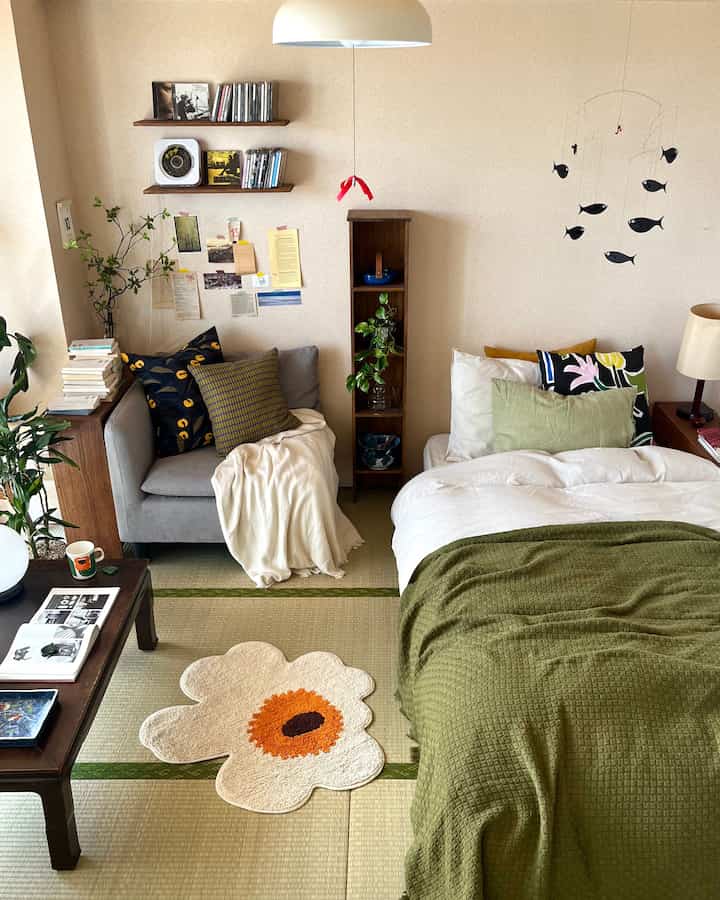 Natural beige-toned Wa-Modern 6-tatami living room featuring cozy sofa and bed with wooden accents and a warm atmosphere