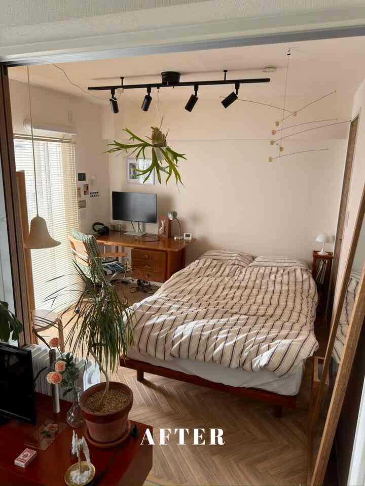 Beige and wood-toned bedroom featuring a desk and plants with a cozy, natural atmosphere