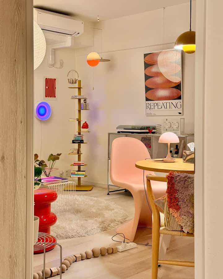 The living room as seen from the next room.

I've decorated the ceiling area with mobiles and a book tower to prevent it from looking bare.

#ColorfulInterior
#PopInterior
#LivingRoom
#DiningRoom
