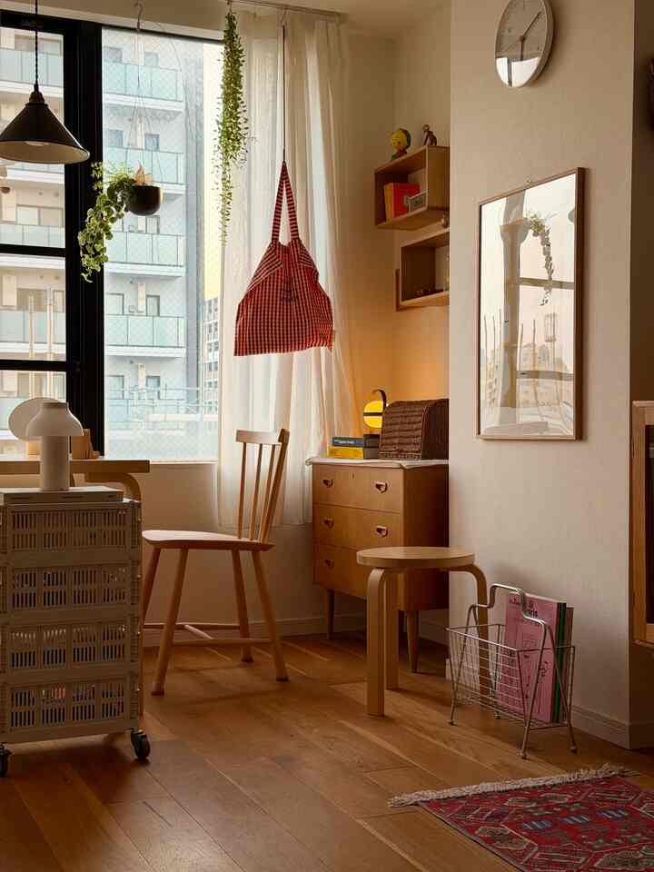 Cozy dining room in calm brown and white tones featuring wooden furniture and natural light