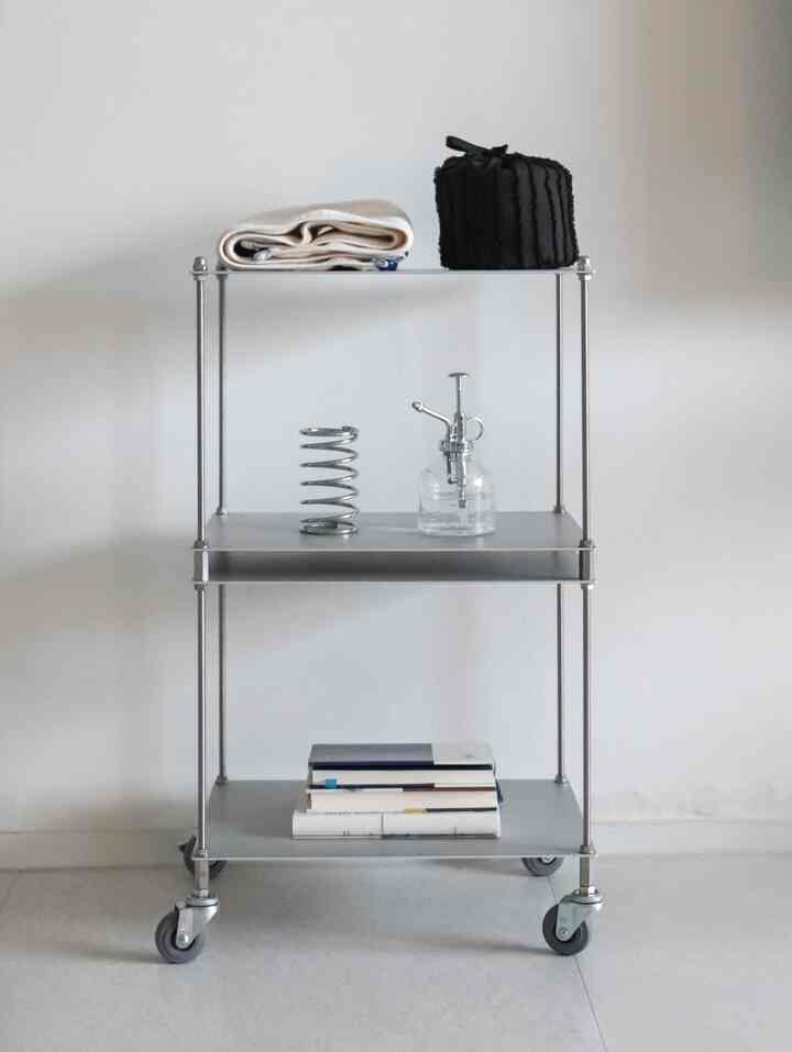 Silver aluminum modular shelving trolley with wheels, minimalist modern storage furniture