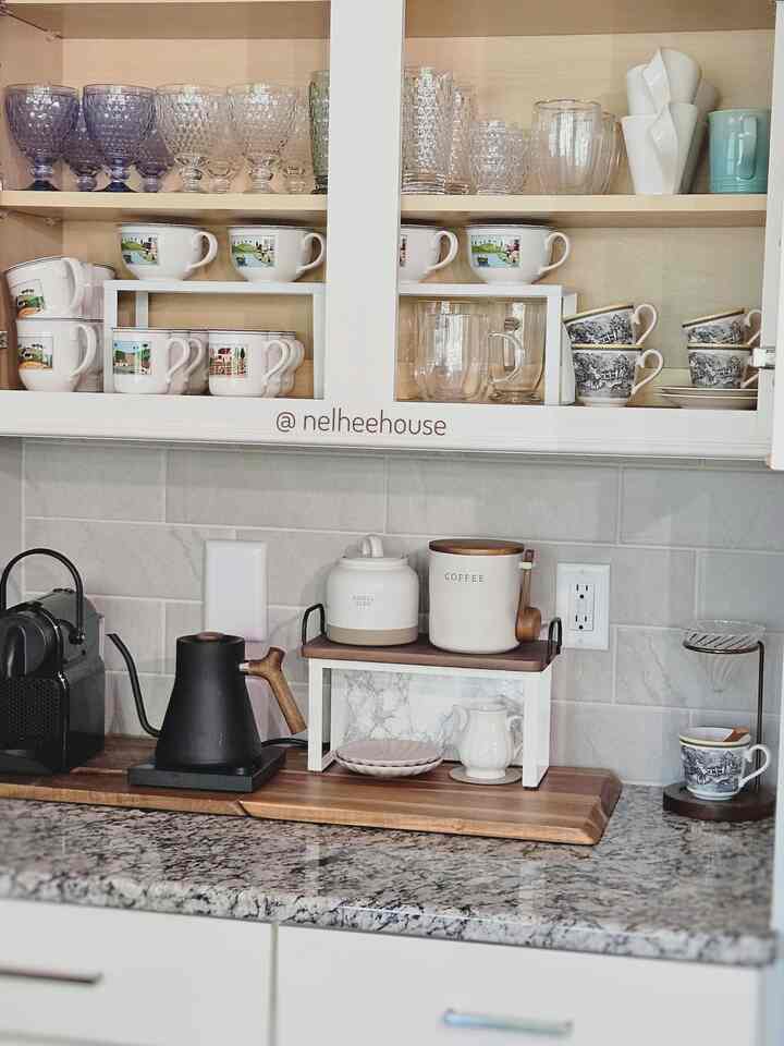 My coffee station ☕️ and mugs cabinet!
Pro tip for organizing your mugs and cups: 1. Use a shelf riser to utilize both under & top of the shelf space. 2. Arrange the same type of mugs in a vertical display just like grocery store shelves! NO shorter mugs in front and taller ones at the back. This way you will have to clear the front in order to grab the taller one at the back. Not efficient! 3. Use hard to reach shelves more efficiently. Lower shelves are for mugs that you use daily and top shelves are great for cups that are seldomly used🍸

#kitchen #cabinetorganization #coffeestation #coffeecup #mugs #organization #organizedkitchen #tidykitchen