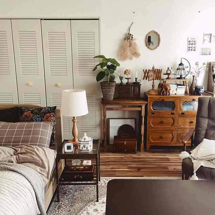Natural wood tone living room featuring vintage furniture and cozy decor elements