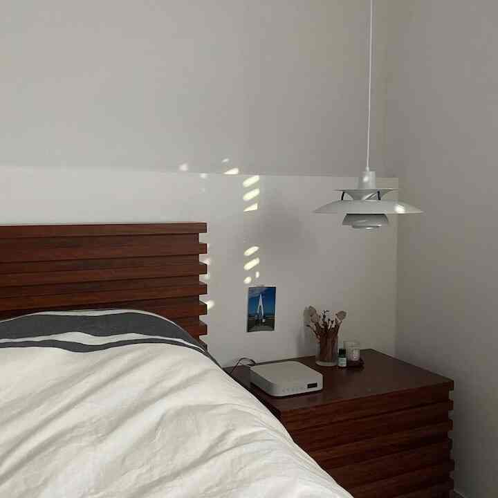 Creating the perfect environment for uninterrupted sleep with just one pendant light. #SleepHaven #BedroomBliss #LightingGoals