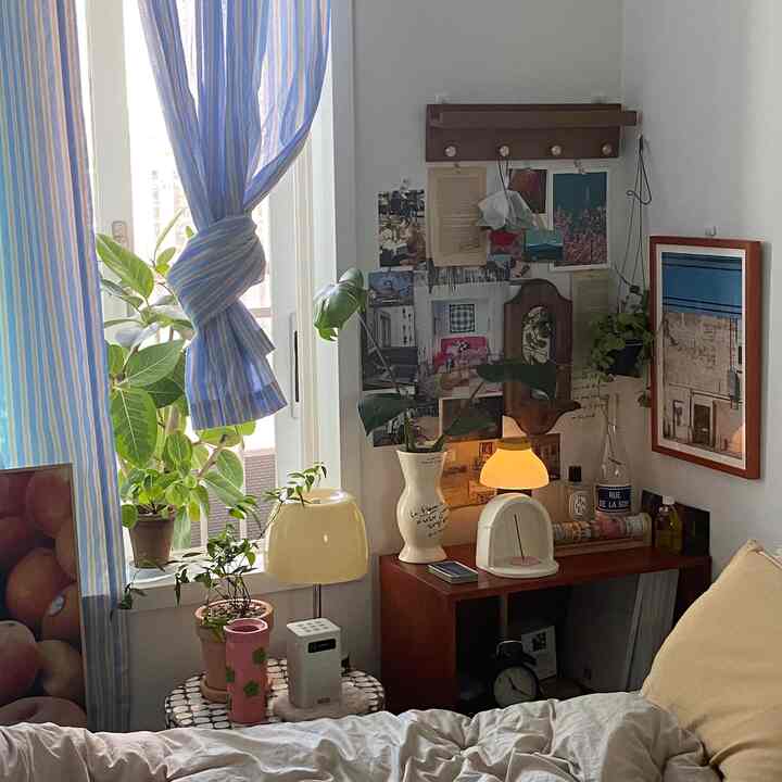 A space filled with favorite knick-knacks and photos. #PersonalTouches #MemoriesOnDisplay #DecorDelights