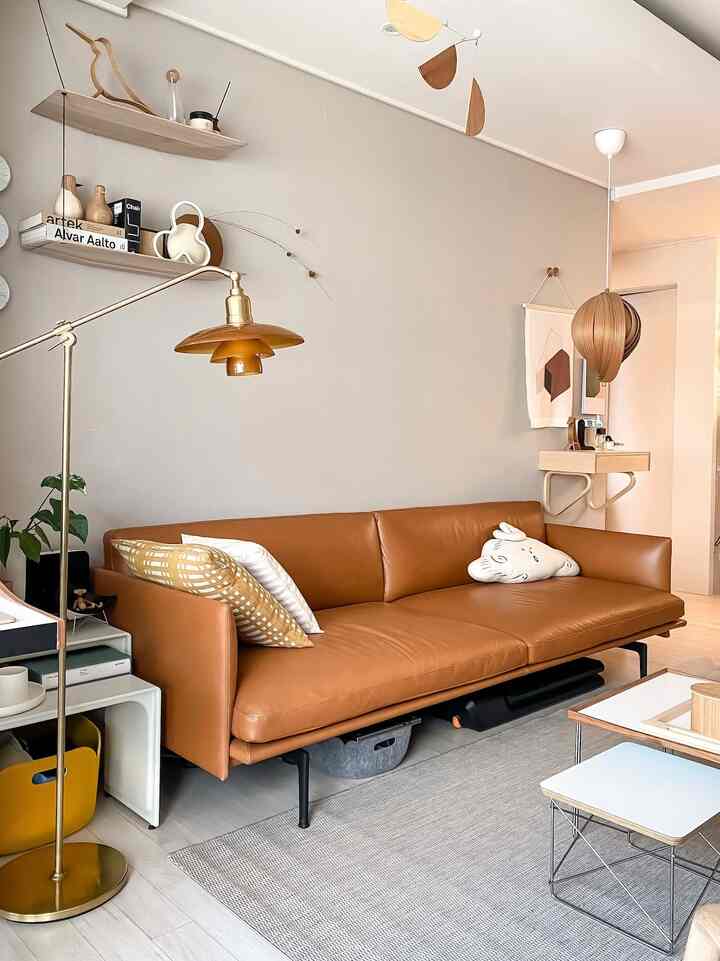 Embracing the warmth of brown in the living room. #BrownDecor #NeutralPalette #EarthyTones