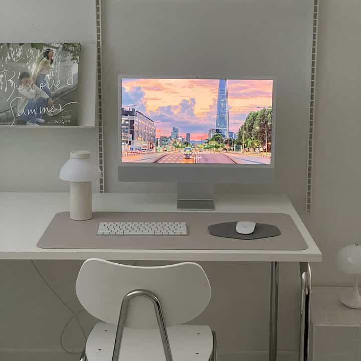 An office space in serene white hues. #WhiteOffice #MinimalistStyle #HomeWorkspace