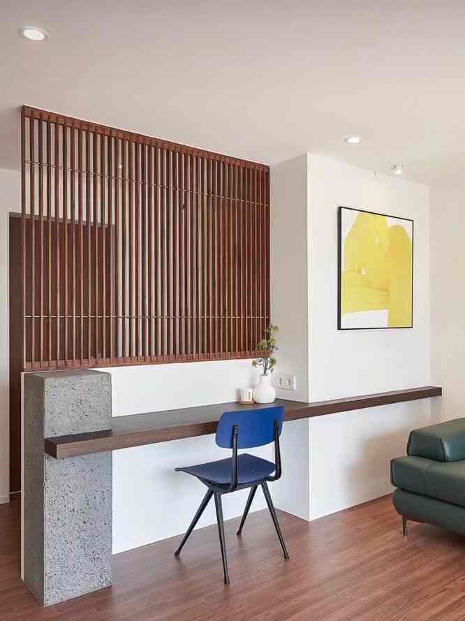 Adding a unique touch with a partition between the entryway and living room. #PartitionDesign #SpaceDivider #InteriorInnovation