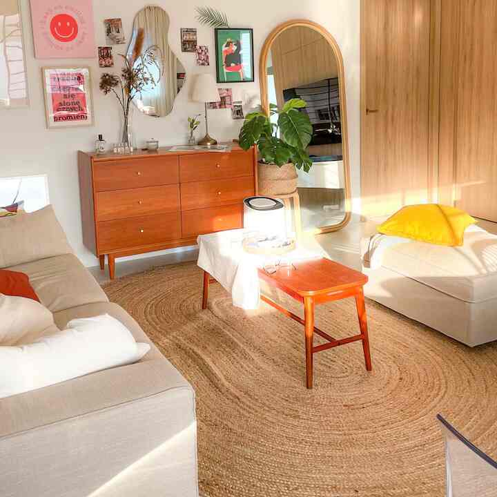 Mixing colorful items with wooden furniture for a lively space. #ColorfulMix #WoodenAccents #VibrantInteriors