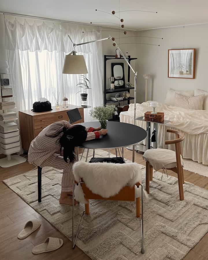 Natural Nordic style single household living room and bedroom with white and wood tones