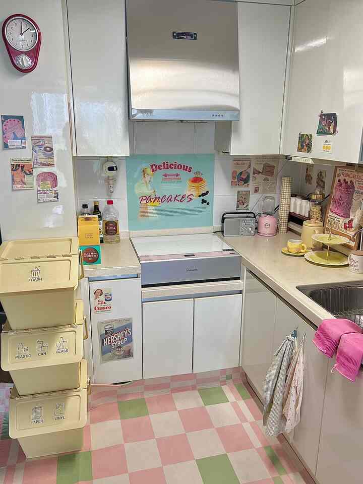My entire kitchen #color interior 
Pink 💗 yellow 💛 light blue 🩵 as the basis 
I mixed a little bit of red ❤️ and light green 💚
I wanted to decorate it like a kitchen in a vintage movie☺️
#Recommended color props ✨✨
I didn't have a good place to put the trash can at home, but I placed the #buttercolor #recycling bin because it looks pretty even in the kitchen! 
I'm satisfied because the trash can is right next to it, so it's convenient and it looks pretty! 

#Trash bin recommendation #separate recycling bin #separate recycling #follow-back #emotional kitchen #vintage #vintage interior #20 pyeong kitchen #rug #vintage crockery #dishes #tea cup #trash can #postcard #wall decoration #kitchen decoration #kitchen interior #induction #radio # Dishcloth #folding box #clock #poster #followback #kitchencloth #blender 