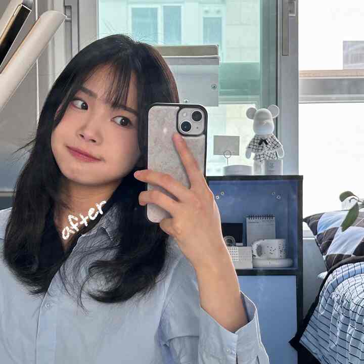 White and blue toned 6-tatami bedroom with bed near window, mirror reflecting room, and shelf with coffee mug in cozy single household space