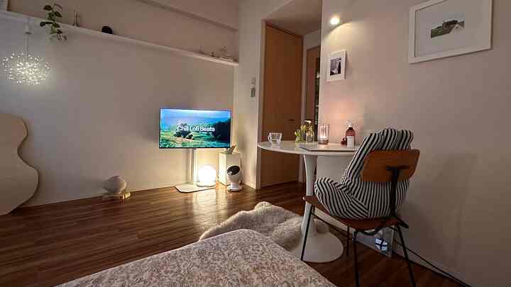 Cozy living room in white and brown tones for a single household, featuring a modern small home cafe and remote workspace