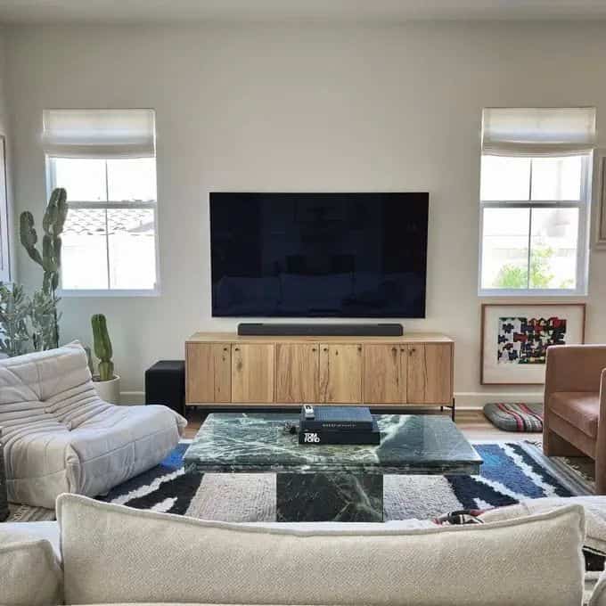 My white-beige lounge chair perfectly complements my beloved old sofa! 🛋️✨ Loving the blend of comfort and style in my cozy space. #HomeDecor #LoungeLife #CozyVibes #MidCenturyModern #MarbleCoffeeTable #ScandinavianDesign