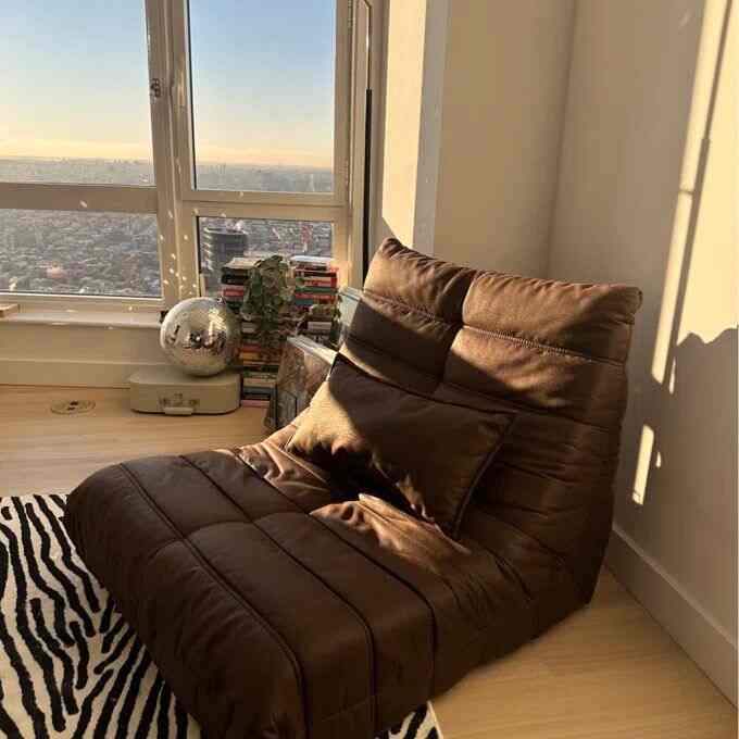 Enjoying a sunny weekend in my favorite lounge chair! ☀️🪑 Perfect for soaking up the warmth and good vibes. #WeekendVibes #SunnyDays #RelaxationMode"
 #ComfortZone #HomeVibes #LoungeLife #Togo #Togodupes #LoungeChair #ZebraRug #ModernDecor