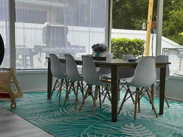 Our dining area feels like a resort getaway! 🌴✨ Dining in paradise every day with these vibe-filled surroundings. #HomeSweetHome #DiningInStyle #DiningTable #EamesChairs #ModernDecor #Hermanmillerdupes 