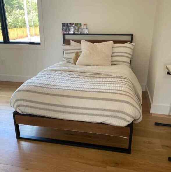 Welcome to my cozy bedroom featuring a beautiful wooden-style bed! 🌙🛏️ It’s the perfect retreat for relaxation and peaceful nights. #BedroomGoals #CozyVibes #Hermanmillerdupes 