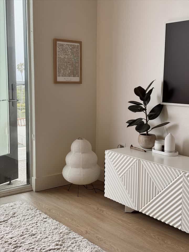 Finding balance in my serene white space with a touch of moody glow. ✨🤍 #InteriorInspo #MoodLighting #ModernDecor #TVStand #FloorLamp #Akaridupes