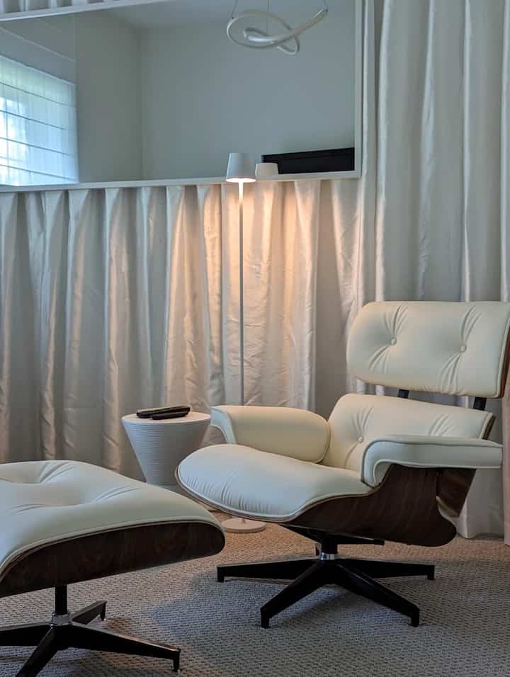 Keeping it fresh and airy with my white lounge chair and matching floor lamp. Perfect for cozy moments! 🤍💡 #MinimalistVibes #HomeSweetHome #EamesLoungeChair #MidCenturyModern #InteriorDesign