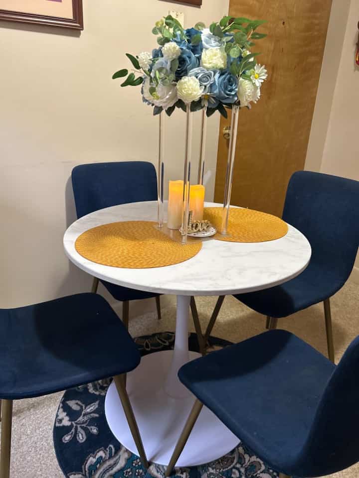 Bringing a splash of color to my space with this vibrant blue chair paired with a sleek white table! 💙✨ #ColorfulDecor #HomeStyle #RoundTable #ModernChairs #ContemporaryDecor