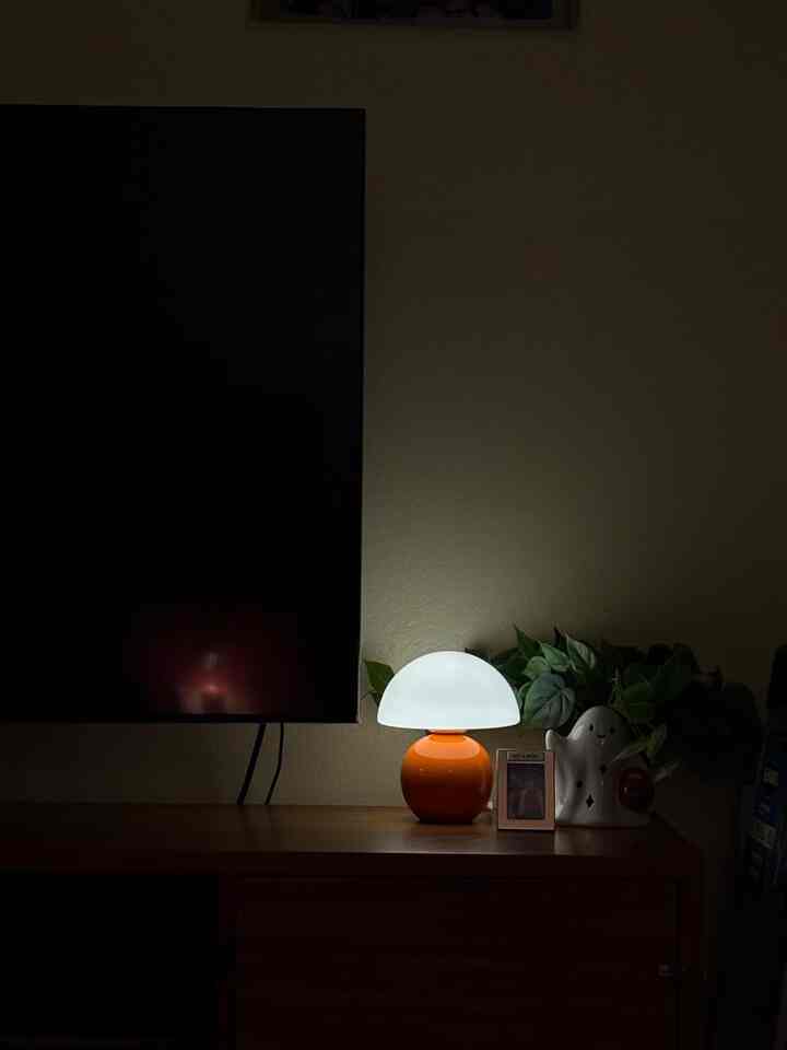 Bringing warmth and energy to my space with this vibrant orange lamp! 🍊✨ A perfect pop of color to brighten up any room! #HomeDecor #ColorPop #LightingGoals #MushroomLamp #MidCenturyModern #MinimalistDecor