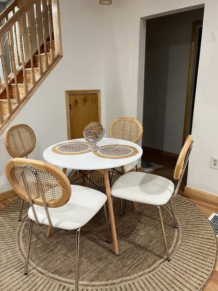 Gathering around this beautiful wooden rattan dining table set brings a touch of nature indoors! 🌿✨ Perfect for family meals and cherished moments. #DiningInStyle #NaturalVibes #HomeSweetHome #RoundTable #RattanChairs #ScandinavianDesign