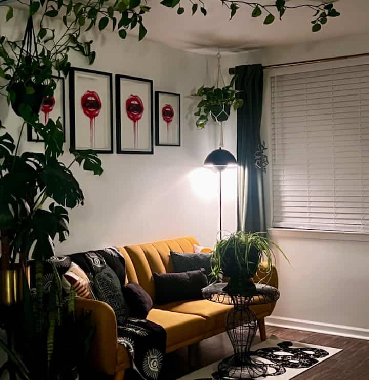 It’s a nice looking lamp and looks just like the photos online. Just keep in mind measurements it seems a tad shorter than the usual floor lamp but it works great for my needs. The pole is really skinny so if you are looking for a really defined statement piece take note. Also keep in mind because of the shade style the light is going to be primarily downward. Overall pretty good quality especially for the price. Material seems decent and the base is weighted and sturdy- the bottom is completely felt lined as well so won’t scratch up floors. It came with “instructions” that provide zero actual instruction, luckily putting it together is common sense and takes about 5 minutes. Overall would definitely recommend

#MidCenturyModern #YellowSofa #IndoorPlants