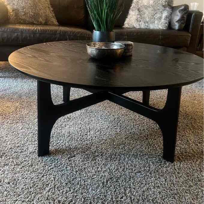 A perfect table! This coffee table could be used with most any style of furniture. It’s plain and simple but very well made and sturdy. I got the black one and it goes well with the dark brown leather couch. It took only a few minutes to assemble.

#CoffeeTable #ModernDecor #LeatherSofa