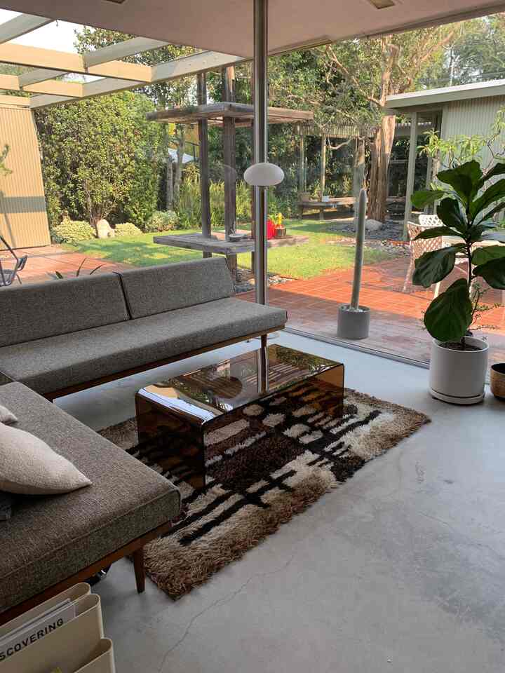 Welcome to my modern living room oasis! ✨🏡 Loving the clean lines, chic decor, and cozy atmosphere. It’s the perfect spot to unwind and enjoy life! 🛋️💖 #ModernLiving #HomeSweetHome #InteriorDesign #MidCenturyModern #GlassCoffeeTable #SectionalSofa