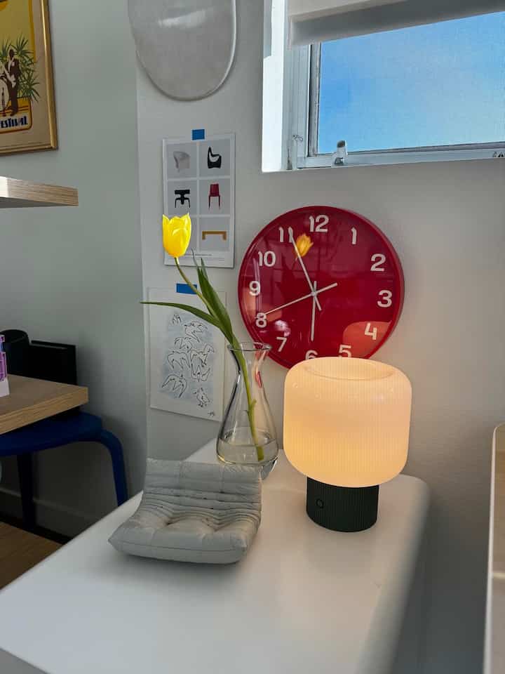 Time is bright and beautiful! ⏰💡 Loving this colorful clock paired with a chic lamp— a perfect combo to brighten up my space. #ColorfulDecor #HomeVibes #TimeWellSpent 