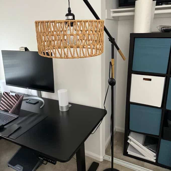 Where productivity meets style! 🖤💻✨ Loving this sleek black computer desk paired with a chic rattan floor lamp. The perfect setup for work and creativity! #HomeOffice #RattanVibes #WorkspaceGoals 