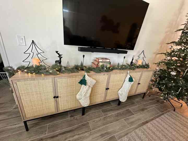 Cozying up to the holiday spirit with festive decor by the TV stand next to our beautiful Christmas tree! 🎄✨ Let the celebrations begin! 
#ChristmasVibes #HomeForTheHolidays
#TVStand #MidCenturyModern #HolidayDecor