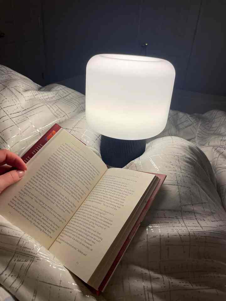Getting lost in a good book with my cozy small table lamp illuminating the pages before bedtime 📚✨ The perfect way to unwind and dream. 
#ReadingNook #BookLovers #TableLamp #ModernDecor #CozyBedroom