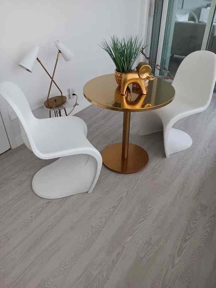 Shining bright with this stunning golden table paired perfectly with sleek white chairs! A touch of elegance for my space ✨🤍 
#HomeDecor #StylishSeating #InteriorInspo #PantonChairs #ModernDecor #MinimalistDesign