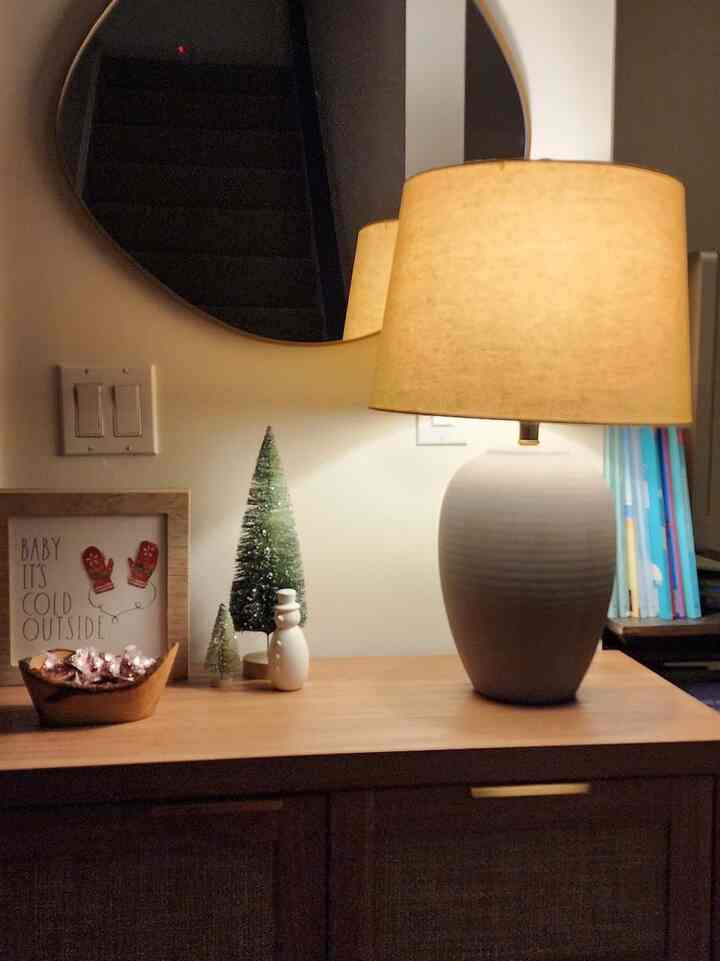 Creating cozy corners with my favorite moody lamp. 🌙💡 Perfect for chill evenings! 
#HomeDecor #MidCenturyModern #TableLamp #WallMirror