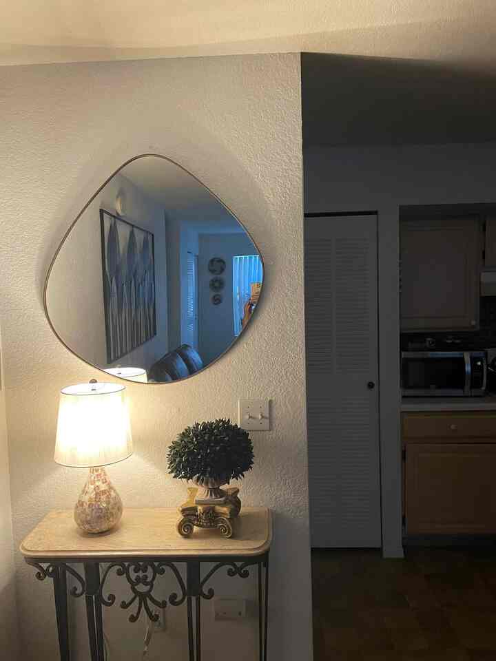 Creating a sleek and welcoming atmosphere right from the entrance! 🚪✨ #ModernHome #DecorGoals #WallMirror #ConsoleTable #TraditionalDecor