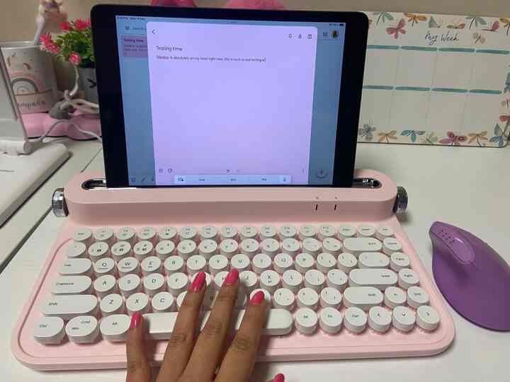 Matching my vibes with this cute pink keyboard and my pinky nails! 💅💖 #PinkPerfection #NailArt 