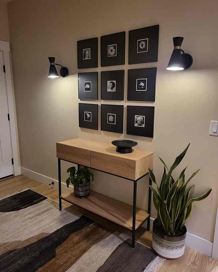 Welcoming vibes in my hallway with a modern console table that adds style and function! ✨🏠 #HomeDecor #HallwayGoals