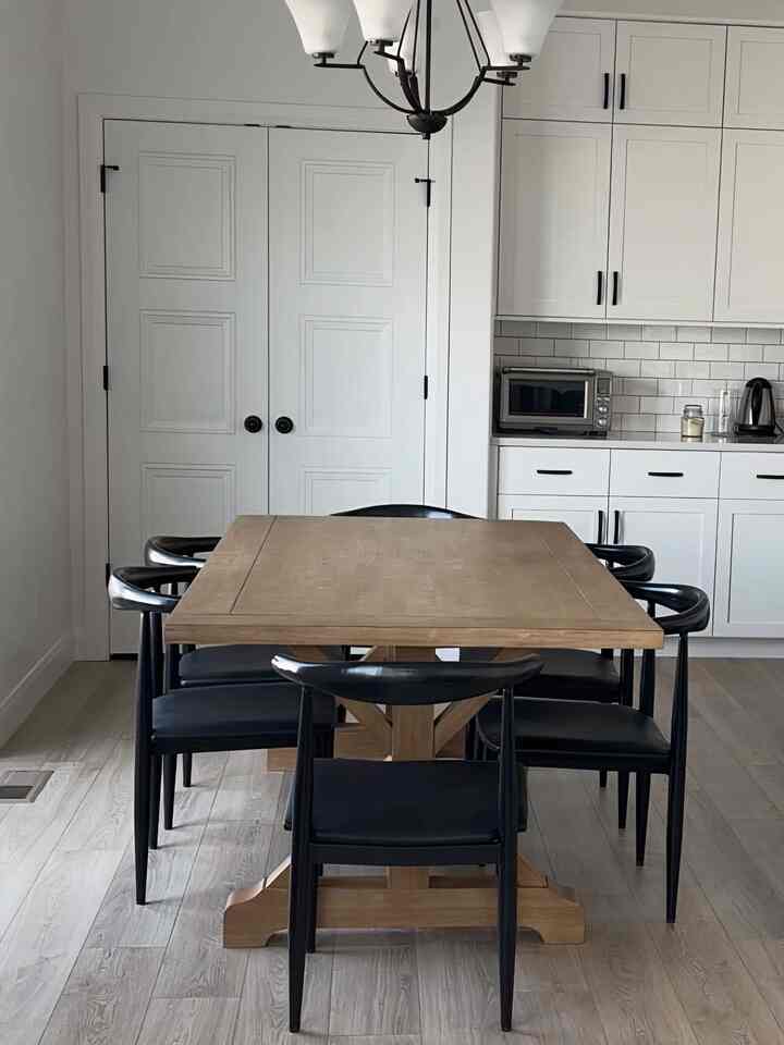 Timeless style with this wooden table paired with sleek black chairs! Perfect for any meal. 🍽️🖤 #DiningDecor #HomeStyle