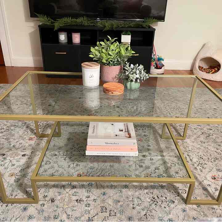 Elevating my living room with this gorgeous gold frame glass coffee table! Such a chic touch to the space! ✨☕️ #HomeDecor #CoffeeTableGoals