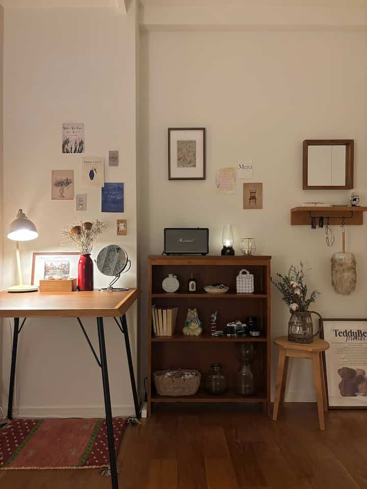 Natural wood-toned workspace with wall decor in a cozy room