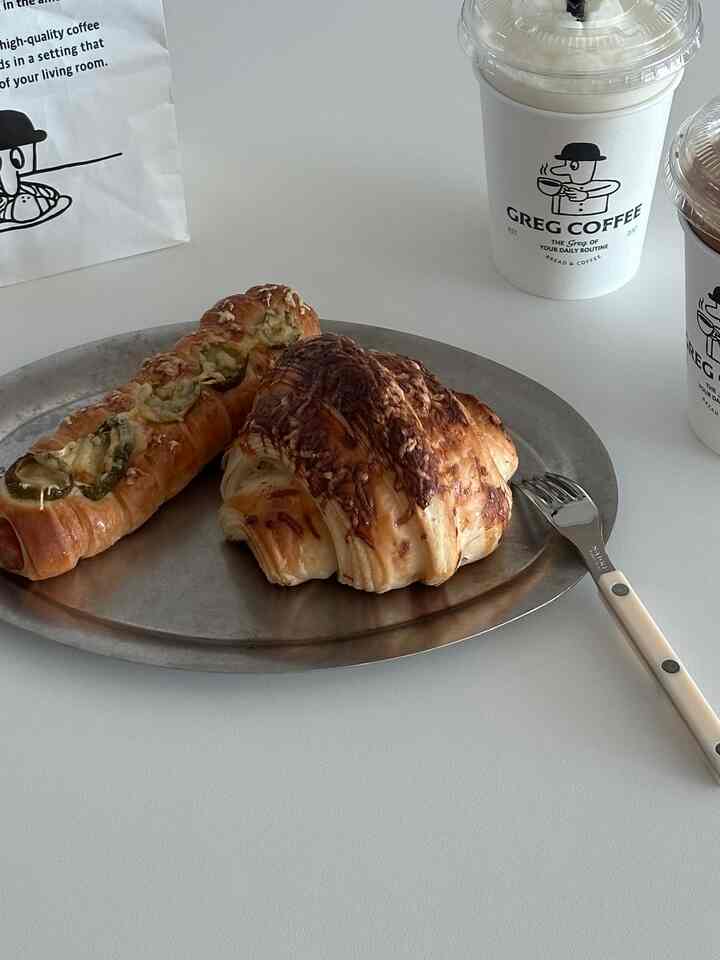White table featuring vintage metal plate with pastries in a cafe-style home cafe setting