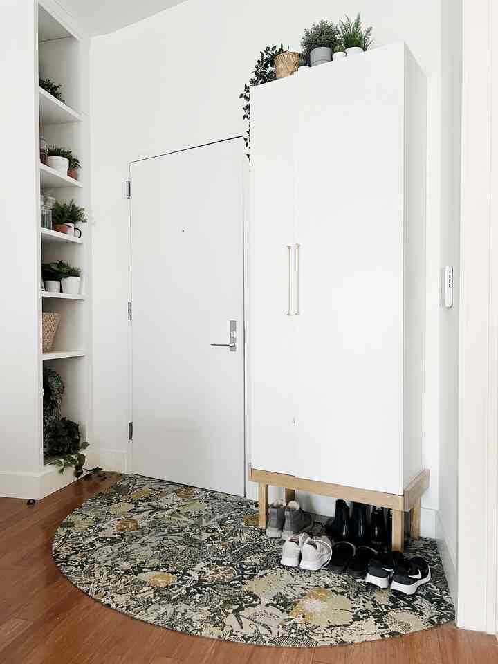 Welcome home. Clean lines, happy plants. #entryway #storage