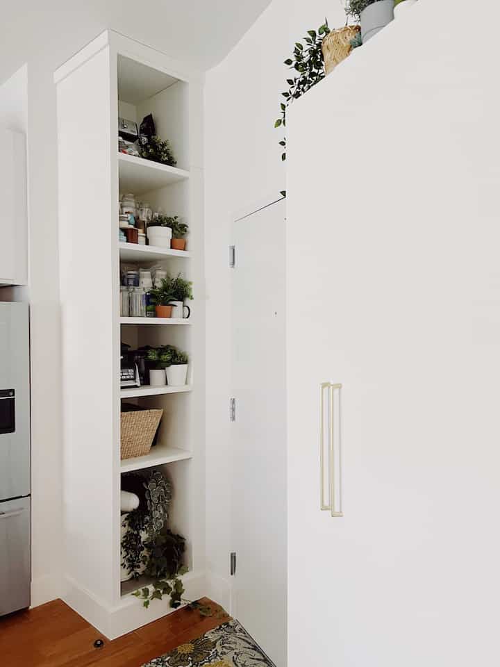 I have an oddly angled and shaped entry area that connects into the kitchen but my DIY open pantry cabinet added so much storage!

#kitchen #entry #contemporary #white