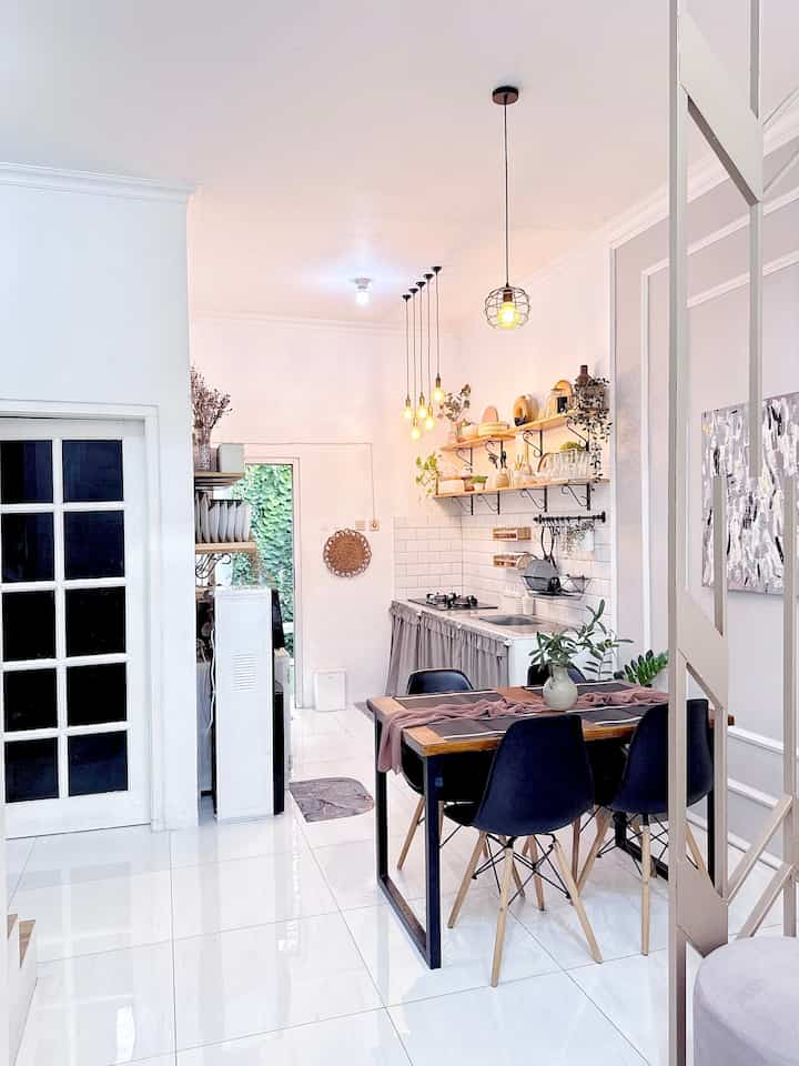 🎀 Open Space Kitchen & Dining 🎀

In the past, in my parents' house, the kitchen and dining room were separate, so it took a bit of time to serve food to the dining table after being cooked in the kitchen.
Learning from that, I built a kitchen and dining room with a unified and open space concept like this. Sure enough, with a concept like this, it saves more time and energy, especially when the morning is quite hectic between preparing supplies and breakfast for my children and husband 🩵

#Kitchen
#DiningRoom
#MinimalistKitchen
#DiningTable
#WoodenTable
#TableMat
#WallPaint
#Shelves
#OpenSpaceKitchen
#OpenSpaceHouse
#HomeWithoutPartitions