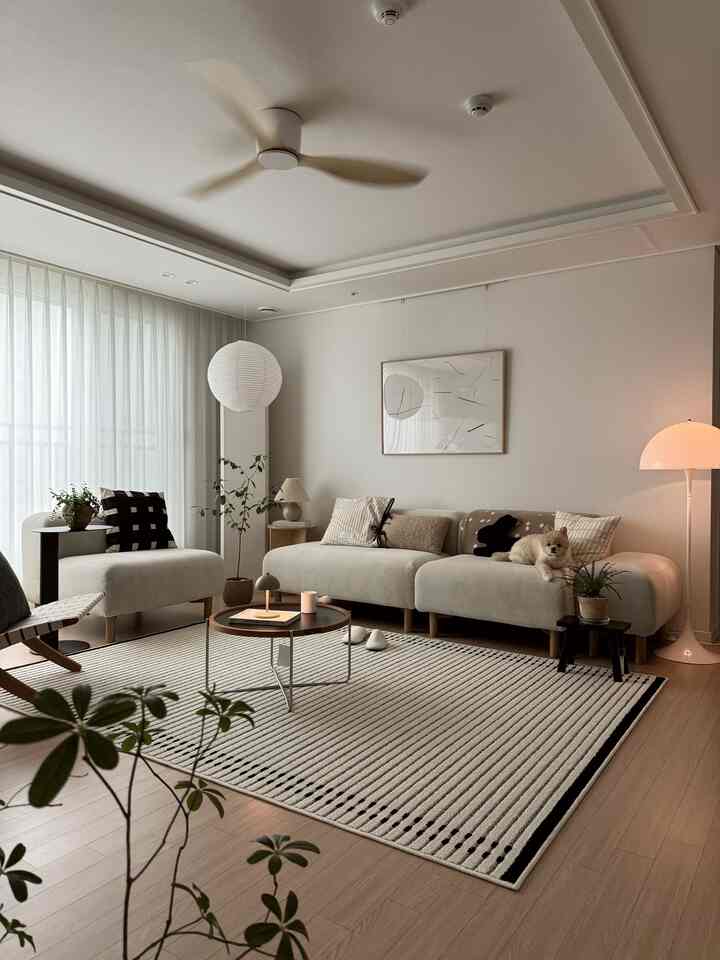 Beige and wood-toned living room featuring modern sofa and coffee table with a cozy natural atmosphere