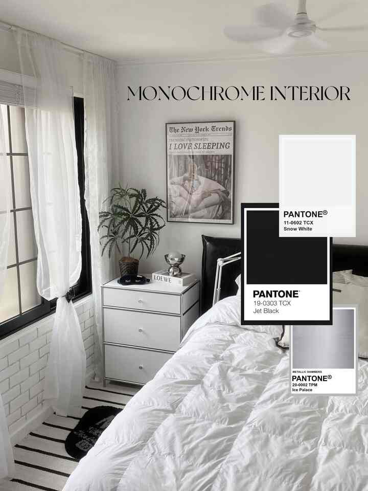 白黒のモノトーン寝室、北欧風の格子窓とレザーのベッドが配置されたシンプルでミニマルな雰囲気のインテリア