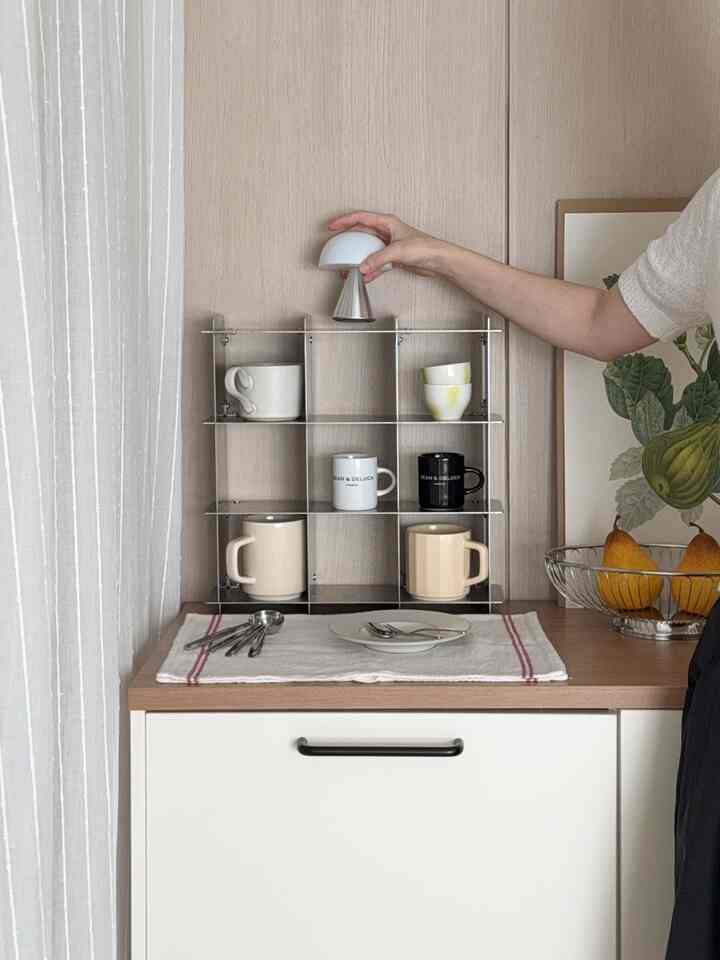 #오감리뷰 This is a review based on my personal experience using and styling the product provided through the program.

Opening a Home Cafe with a Metallic Feel✨

I placed the Agrieverly stainless steel cup shelf in a corner of my kitchen, and just the shelf itself completes the home cafe vibe.

What I love most is its modern design.

It's clean and uncluttered, so placing cups and small items on it creates a display-like atmosphere.

The size is perfect for a small kitchen or living room, and the compartments offer more storage than I expected.

It's perfect for organizing mugs, small lights, and even plates.☺️

The stainless steel material makes it sturdy, easy to maintain, and I also like how convenient it is to use. The perfect metal interior item! ✨

I'm excited to fill my cup shelf with my favorite cups and accessories :)
I recommend this metal cup shelf, which is both stylish and practical. 🩶

#StainlessKitchen #주방인테리어 #어그리어블리 #모던주방소품 #컵보드 #주방정리꿀템 #컵선반 #쇠테리어 #쇠테리어소품 #쇠테리어선반 #쇠테리어주방 #주방용품 #주방정리 #주방정리템 #홈카페 #홈카페인테리어 #홈카페선반 #스텐선반 #컵정리 #머그컵 #포스터인테리어 #이케아포스터 #인테리어소품 #주방수납 #선반인테리어 #홈카페존 #홈카페소품 #맞팔