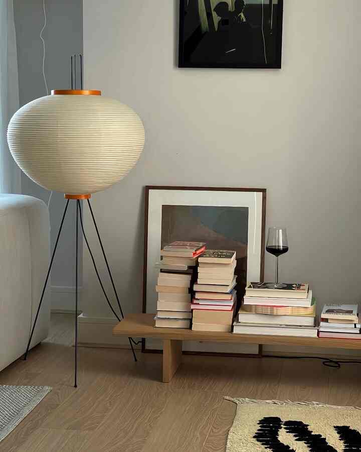 A stack of books, a glass of red, and a paper lantern casting the softest glow.
 The kind of corner that invites you to stay a little longer, finish one more chapter, and forget about the time.

Credit: @Joyceemli

#ReadingCorner #CozyHome #InteriorMood #ModernLiving #BookLoversHome #WarmMinimalism #AmbientLighting #HomeInspiration #QuietLuxury #EverydayMoments
